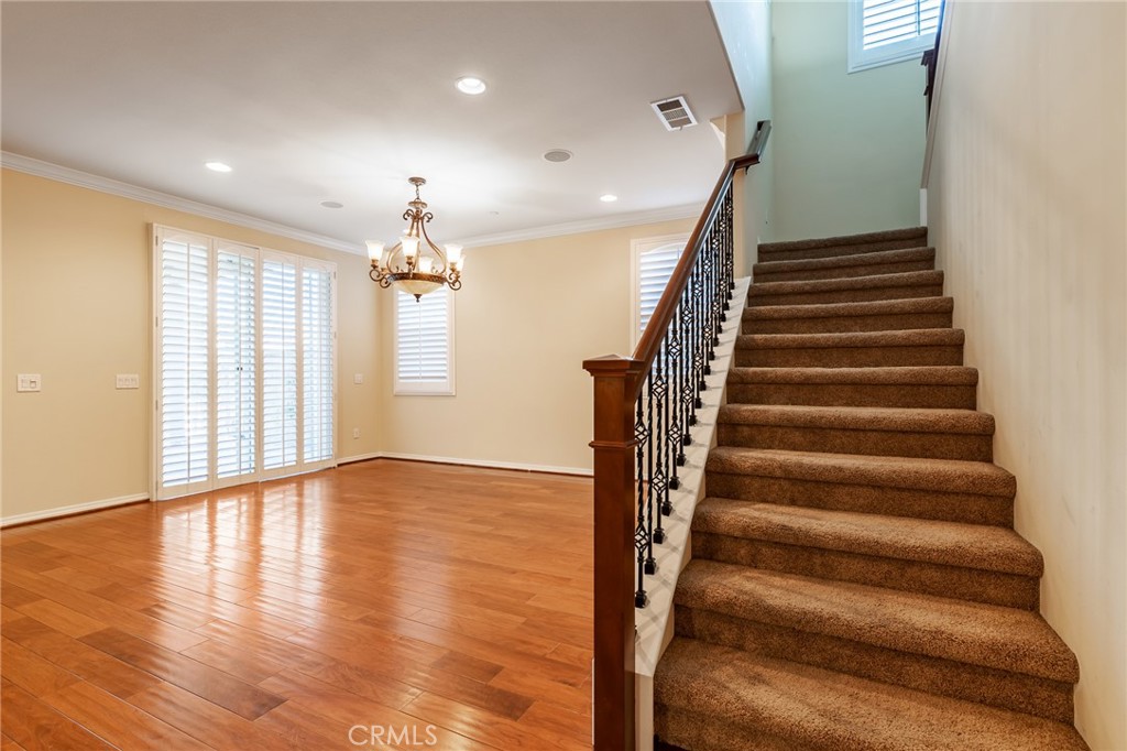 26459 Riverrock Way Saugus, CA 91350 - Photo 23 of 60 a view of entryway and hall with wooden floor