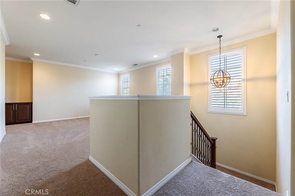 26459 Riverrock Way Saugus, CA 91350 - Photo 25 of 60 a view of an empty room with a window