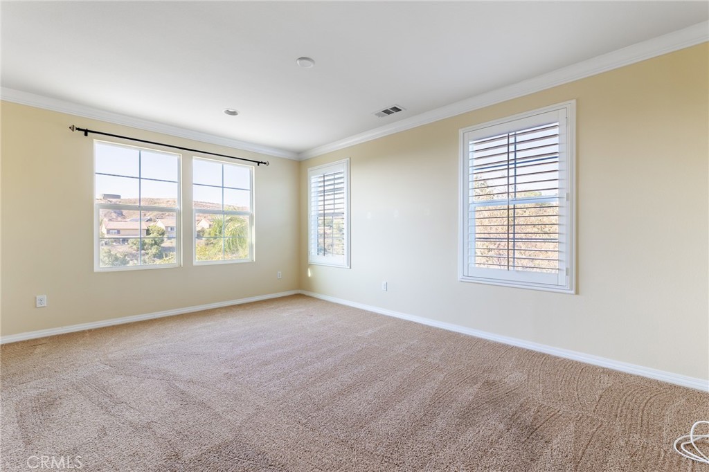 26459 Riverrock Way Saugus, CA 91350 - Photo 40 of 60 a view of an empty room with a window