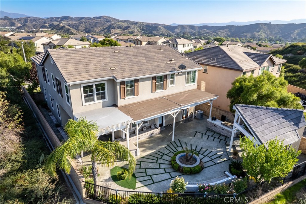 26459 Riverrock Way Saugus, CA 91350 - Photo 4 of 60 an aerial view of a house with outdoor space