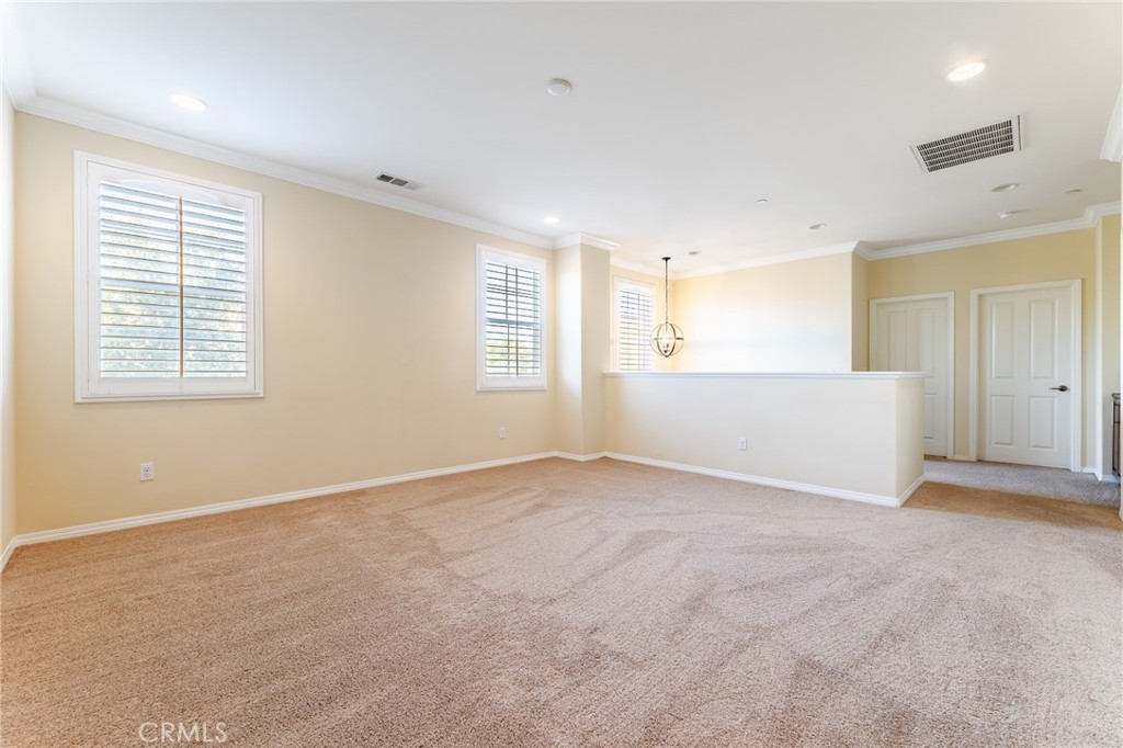 26459 Riverrock Way Saugus, CA 91350 - Photo 43 of 60 an empty room with windows