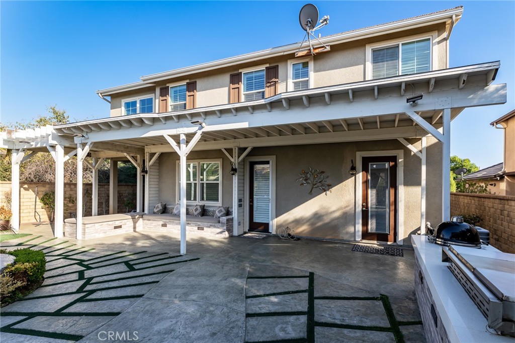 26459 Riverrock Way Saugus, CA 91350 - Photo 52 of 60 a view of a building with large windows