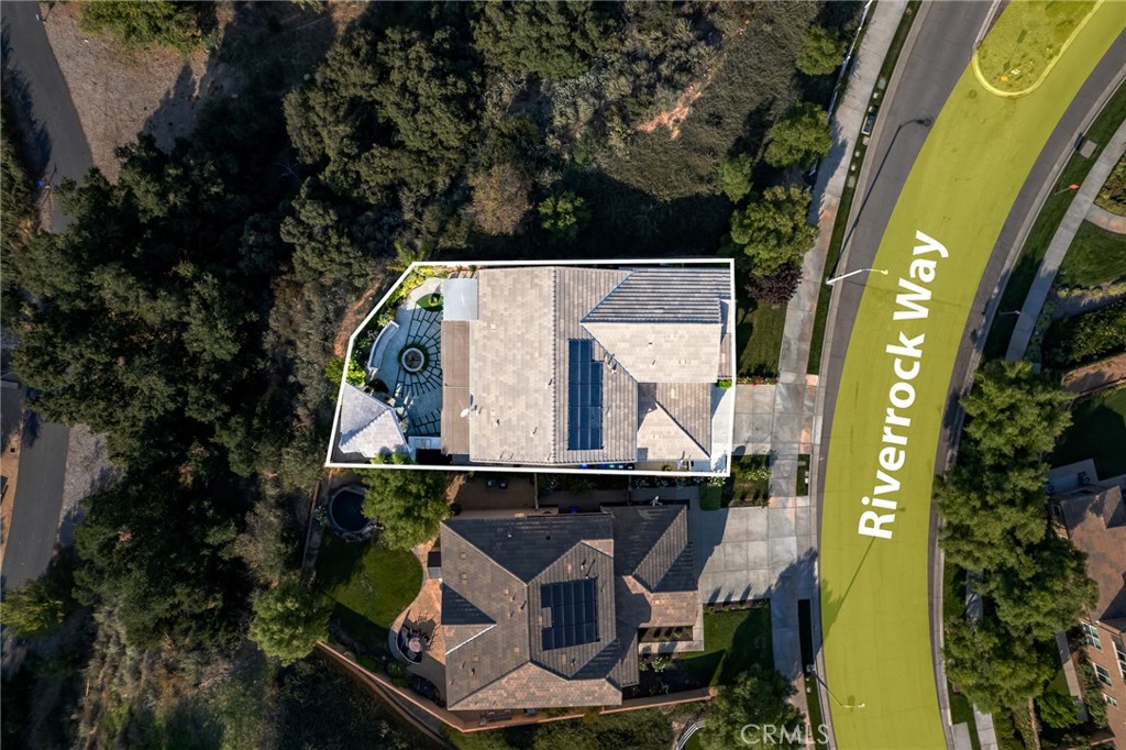 26459 Riverrock Way Saugus, CA 91350 - Photo 54 of 60 an aerial view of a house with a swimming pool
