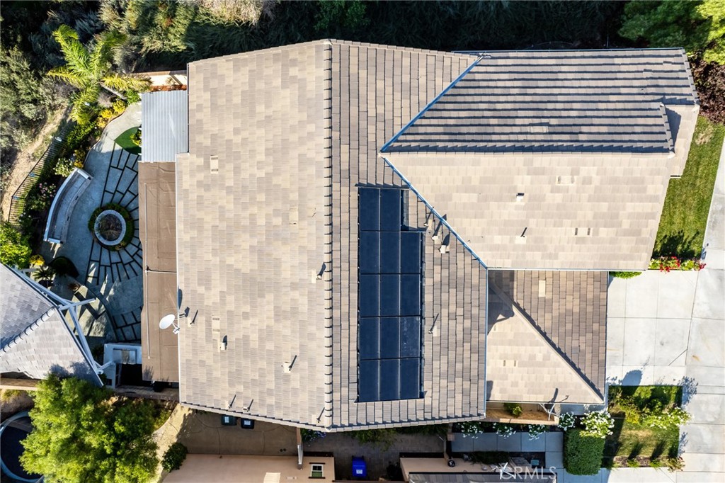 26459 Riverrock Way Saugus, CA 91350 - Photo 58 of 60 a view of a patio with table and chairs with wooden floor and fence