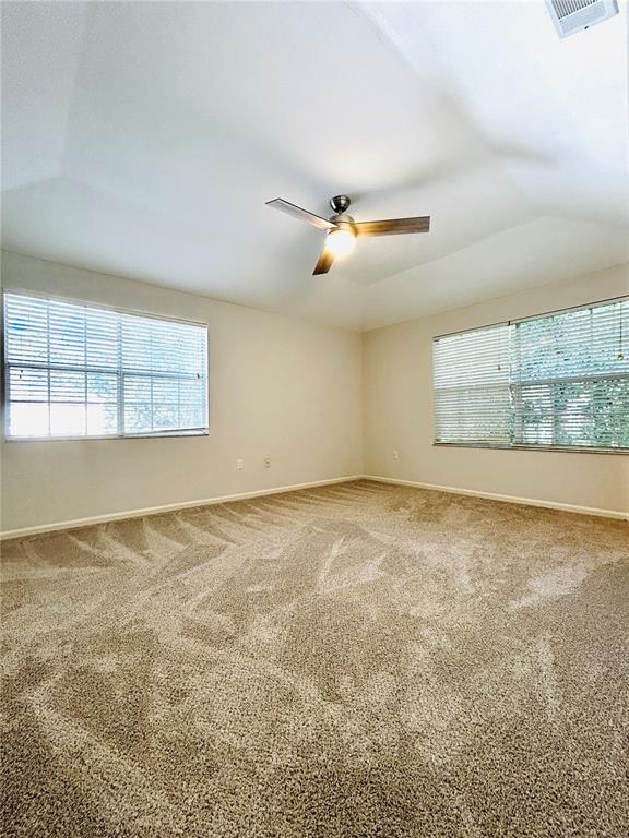 5221 Southwest 97 Drive Gainesville, FL 32608 - Photo 9 of 13 an empty room with a empty space and windows