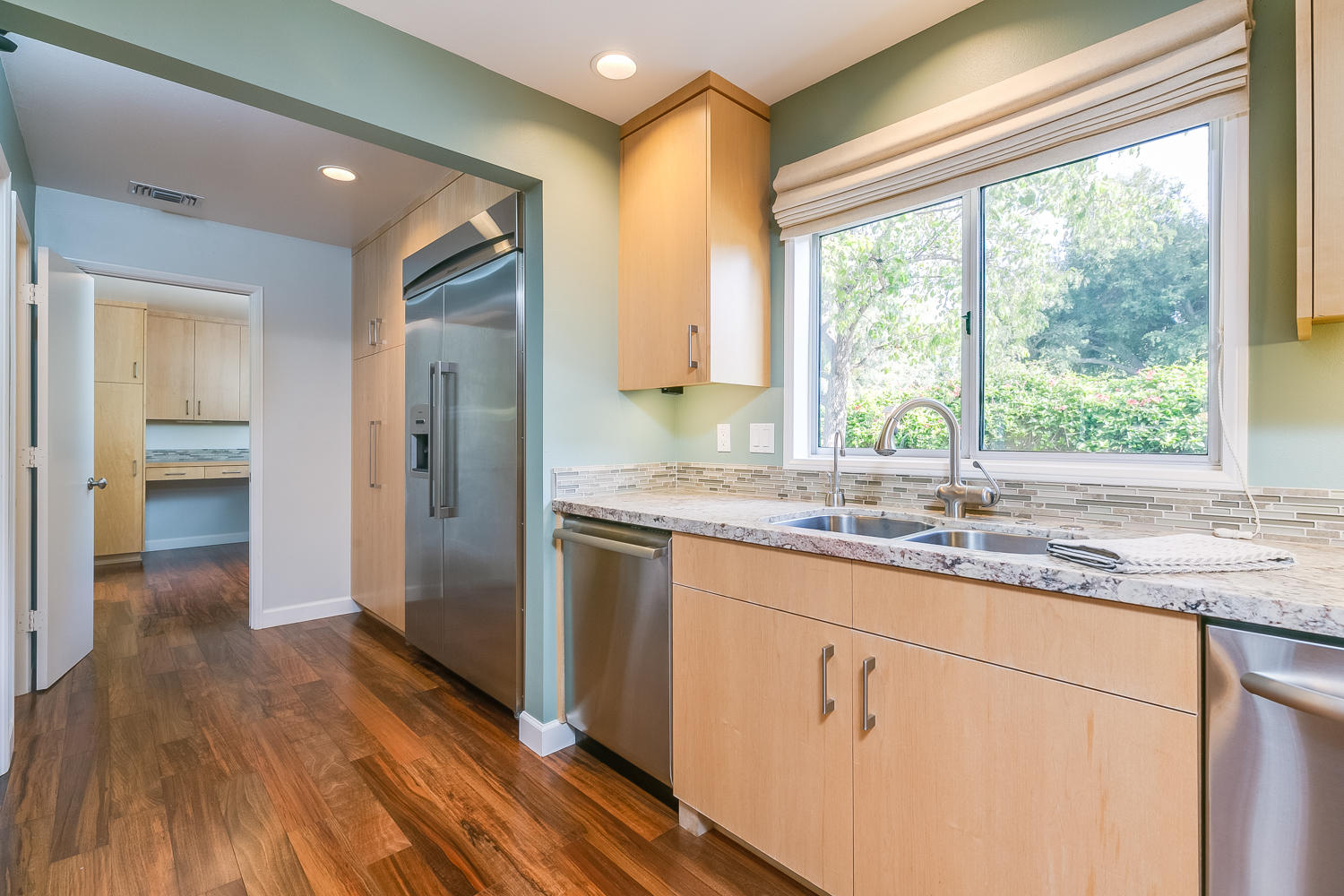 417 Andrew Drive Ojai, CA 93023 - Photo 16 of 31 a kitchen with granite countertop a stove a sink and a refrigerator