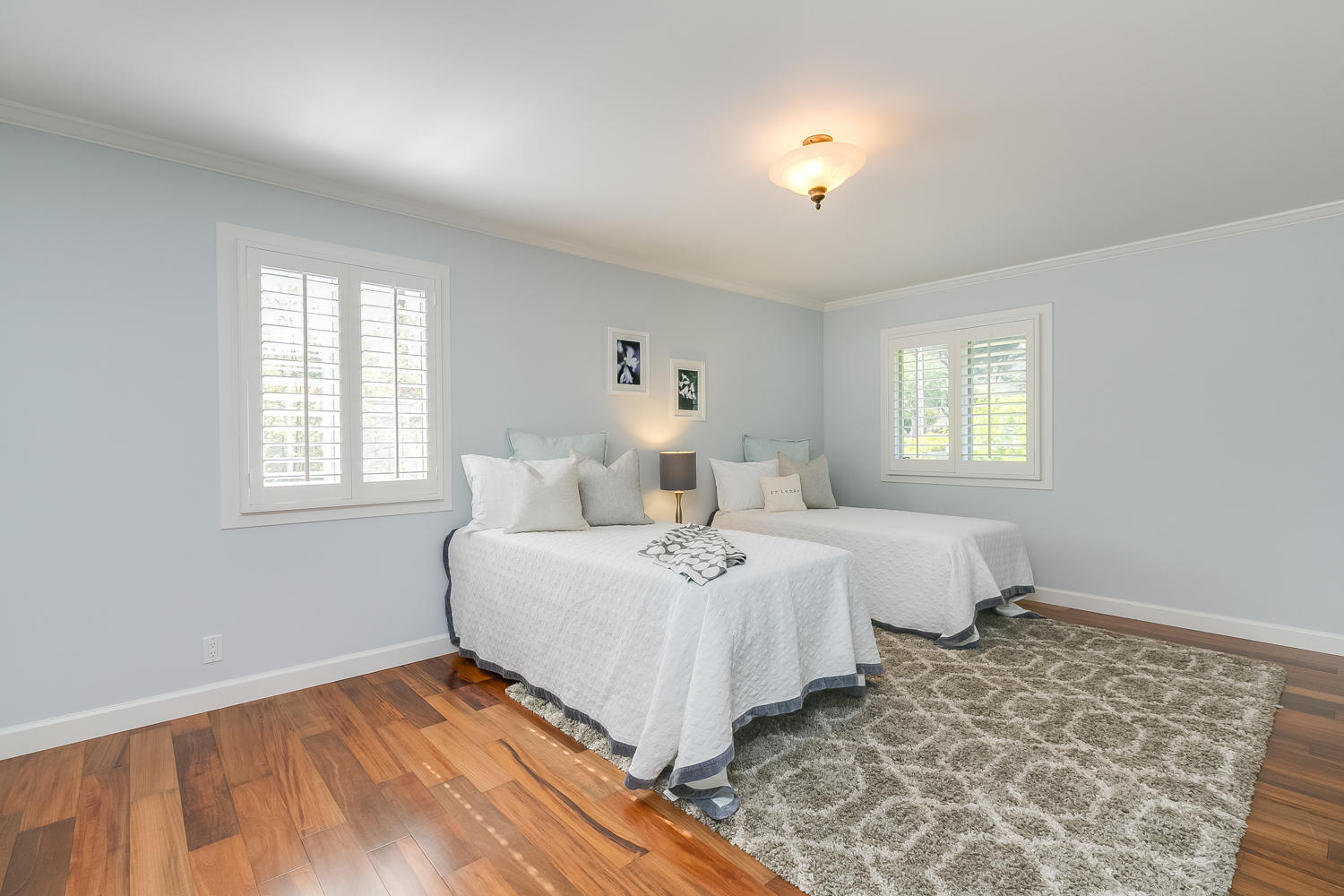417 Andrew Drive Ojai, CA 93023 - Photo 23 of 31 a spacious bedroom with two beds and a window