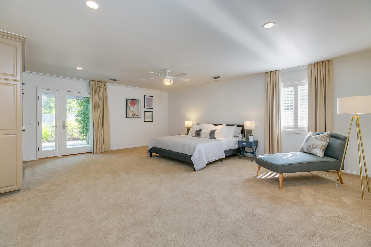 417 Andrew Drive Ojai, CA 93023 - Photo 6 of 31 a spacious bedroom with a bed and a couch