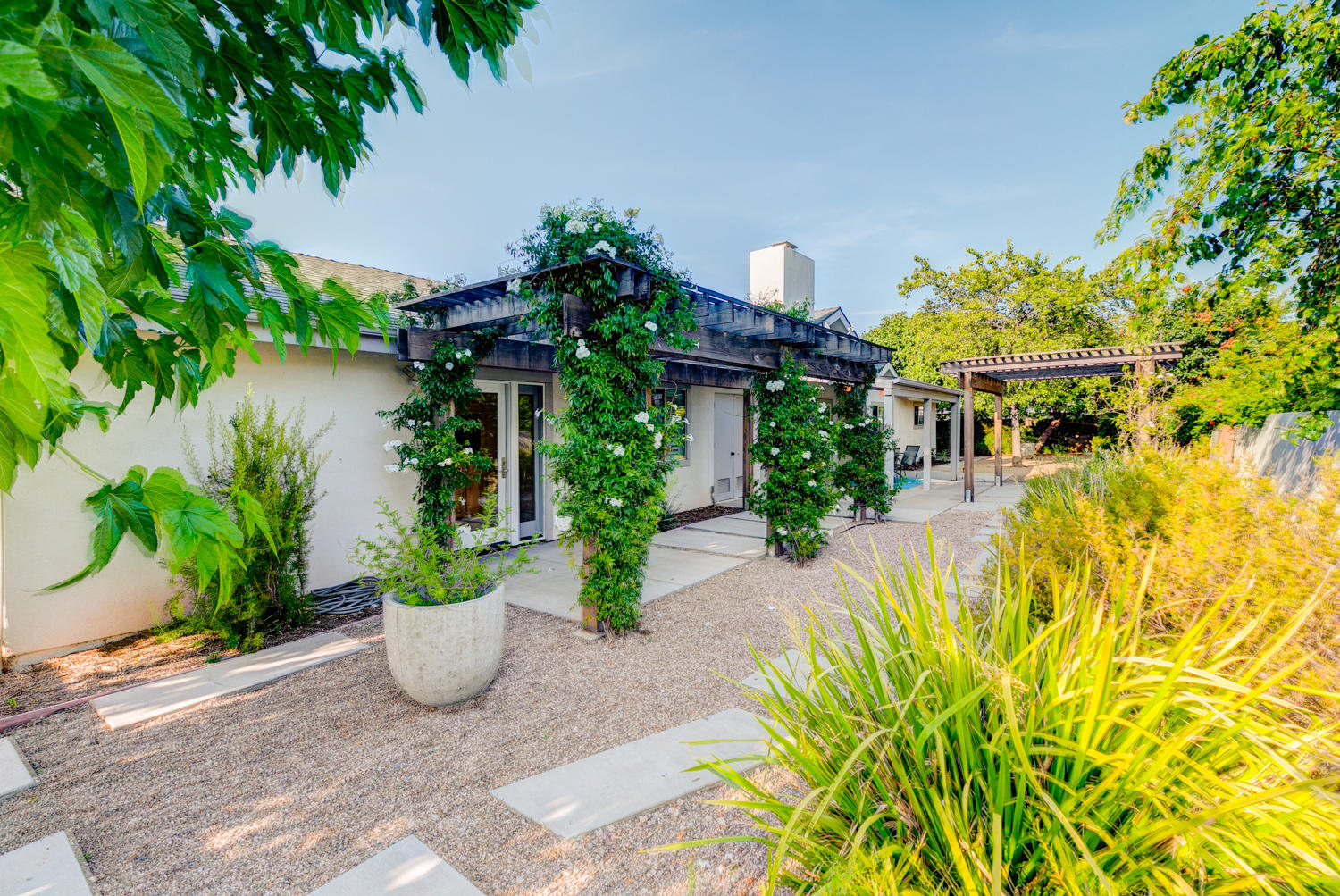 417 Andrew Drive Ojai, CA 93023 - Photo 8 of 31 a view of a swimming pool with potted plants and palm trees