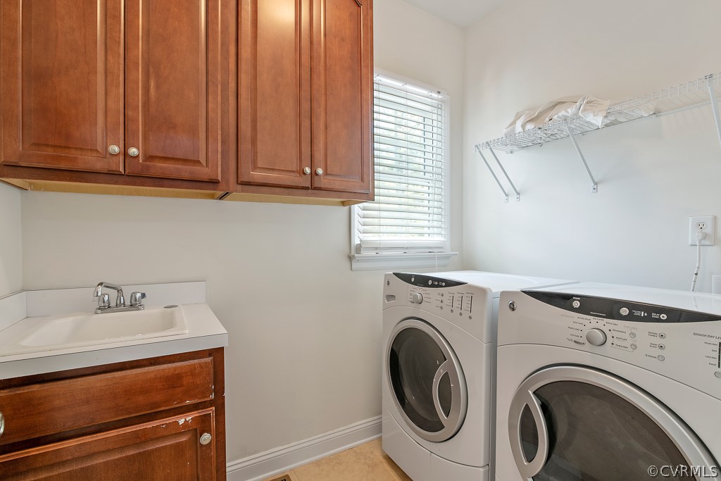 3412 Post Mill Place Midlothian, VA 23113 - Photo 20 of 50 1st level laundry room with tile flooring, sink an