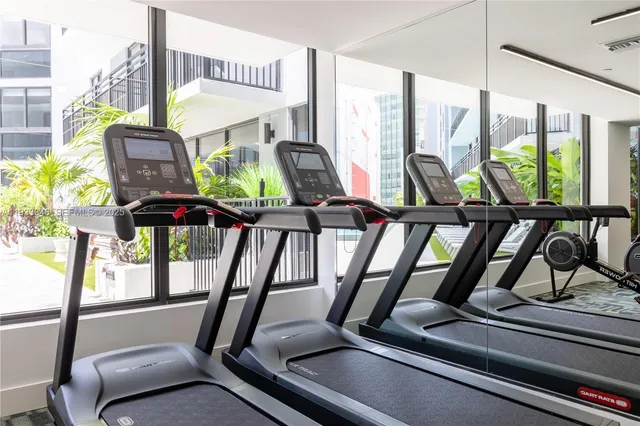 a view of a room with gym equipment