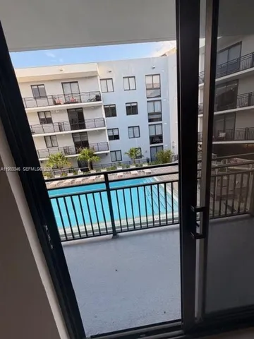 a view of balcony with furniture