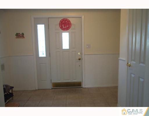 10 Sulliman Road Edison, NJ 08817 - Photo 2 of 9 a view of a closet area