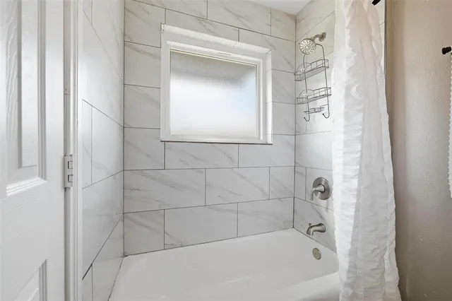 a bathroom with a bathtub