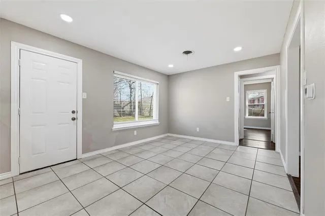 a view of an empty room and window