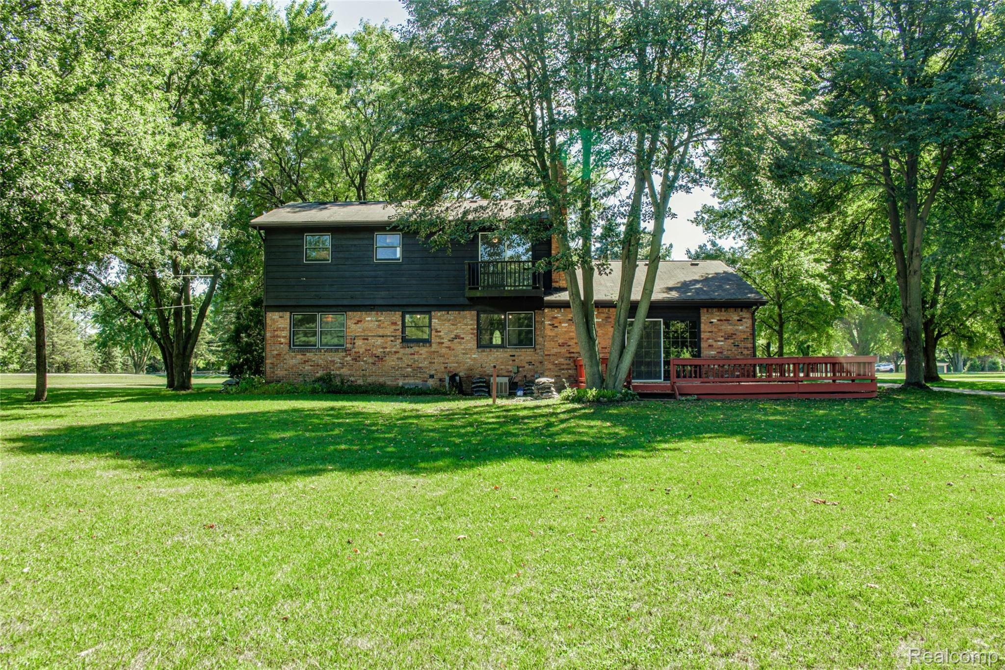 58504 Travis Road New Hudson, MI 48165 - Photo 42 of 53 Back of home