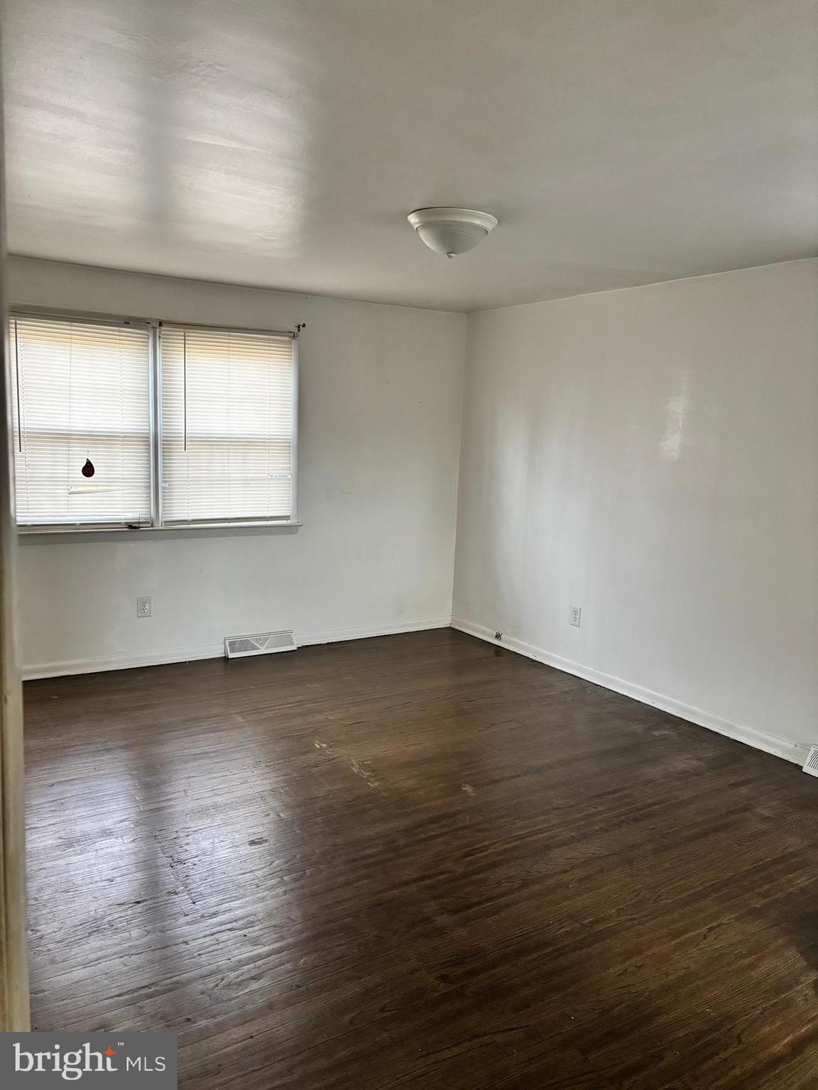 148 Diamond Avenue Pine Hill, NJ 08021 - Photo 22 of 35 an empty room with wooden floor and windows