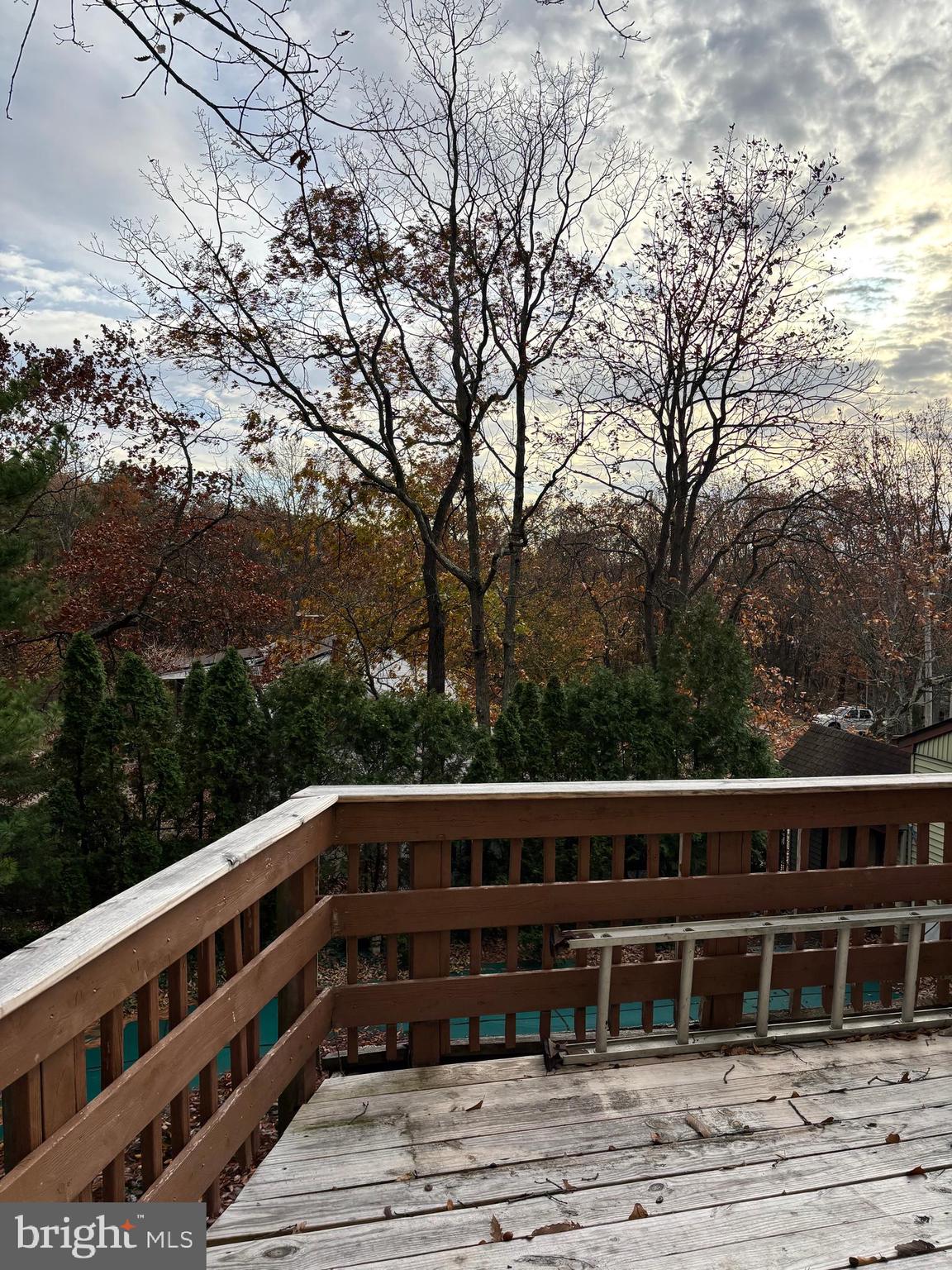 148 Diamond Avenue Pine Hill, NJ 08021 - Photo 32 of 35 a view of a balcony with wooden floor and fence