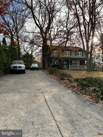 a view of street with parked cars