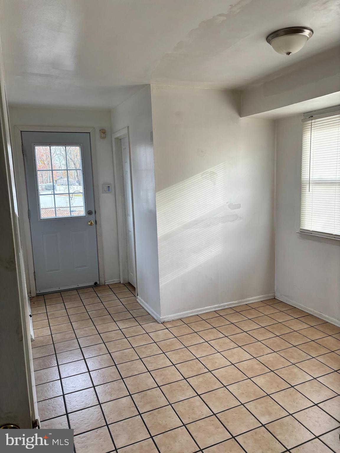 148 Diamond Avenue Pine Hill, NJ 08021 - Photo 6 of 35 an empty room with windows