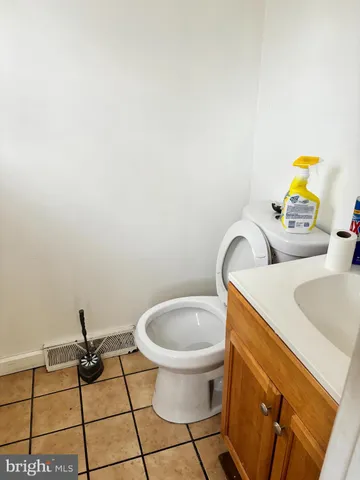a bathroom with a sink and toilet