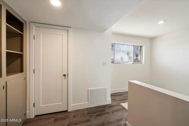 a view of room with window and closet