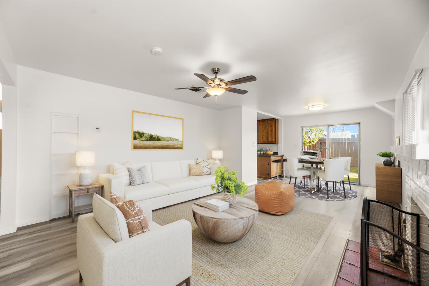 10513 Spaulding Way Rancho Cordova, CA 95670 - Photo 3 of 31 Virtually Staged Living Room with fresh interior paint and laminate flooring