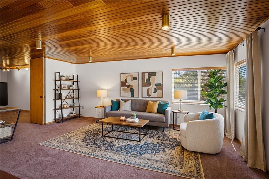 5 Bayard Road, Unit 219 Pittsburgh, PA 15213 - Photo 12 of 35 a living room with furniture and a window