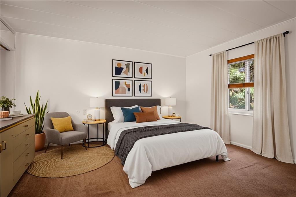 5 Bayard Road, Unit 219 Pittsburgh, PA 15213 - Photo 14 of 35 a spacious bedroom with a bed a couch and a window