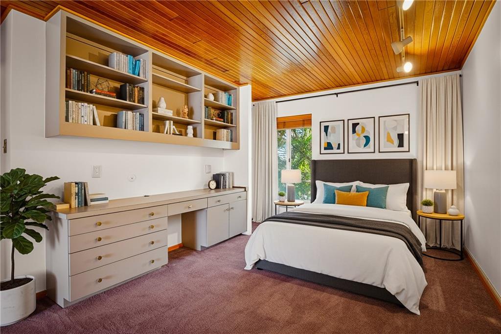 5 Bayard Road, Unit 219 Pittsburgh, PA 15213 - Photo 18 of 35 a bed room with a bed and a desk