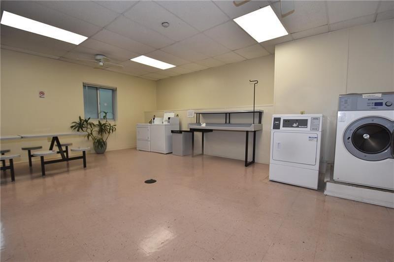 5 Bayard Road, Unit 219 Pittsburgh, PA 15213 - Photo 23 of 35 a living room with furniture and a table
