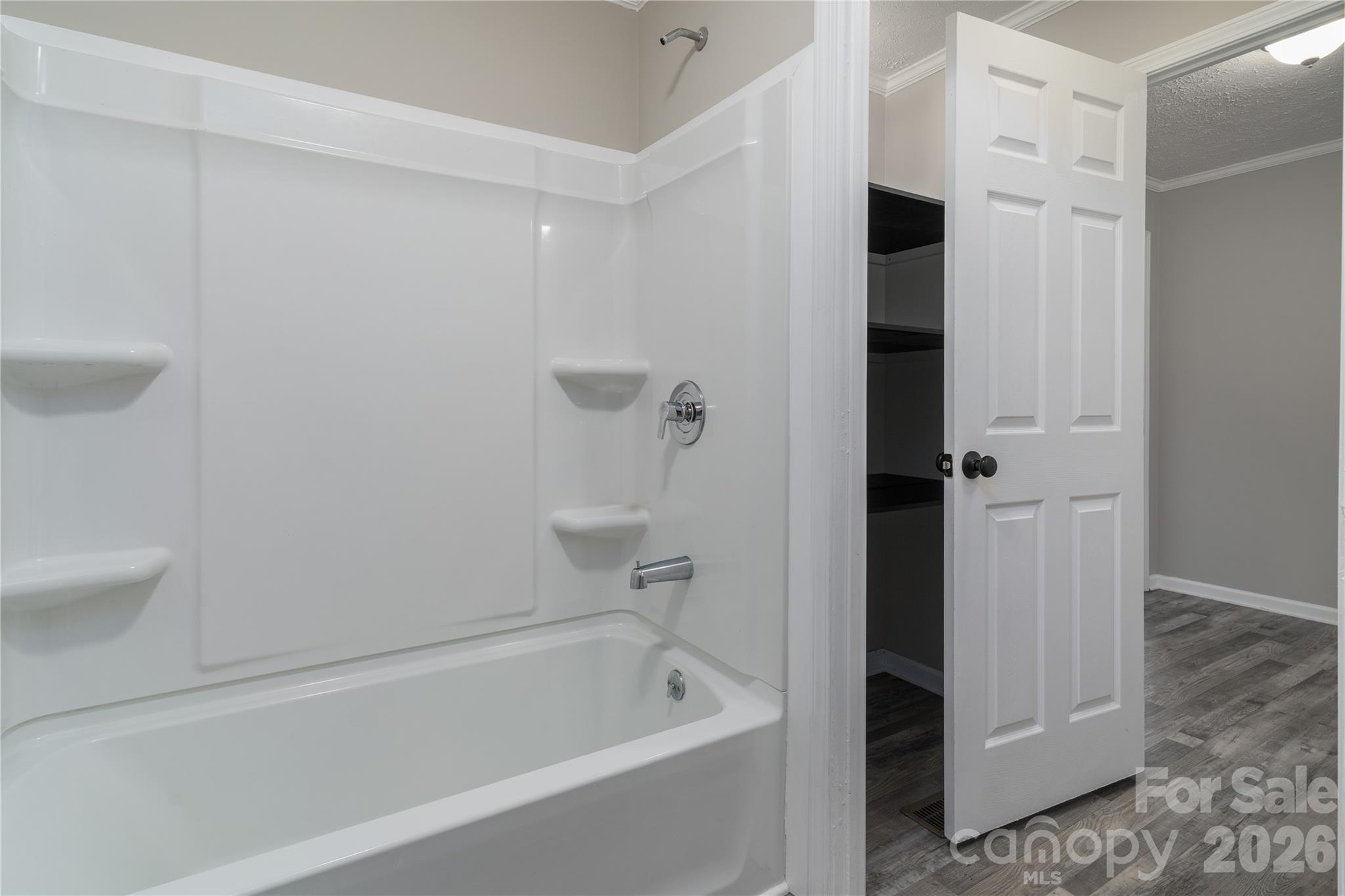 922 Lavender Road Grover, NC 28073 - Photo 32 of 43 a bathroom with a bathtub and a shower