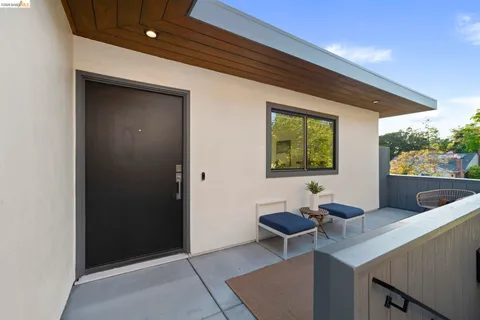 a room with chairs and a window