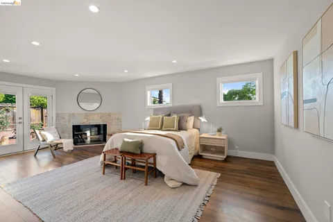 a room with a bed and a window