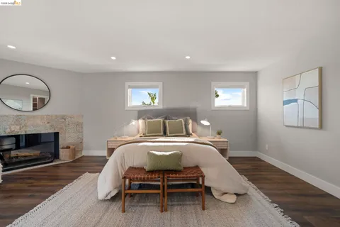 a bedroom with a bed and a table