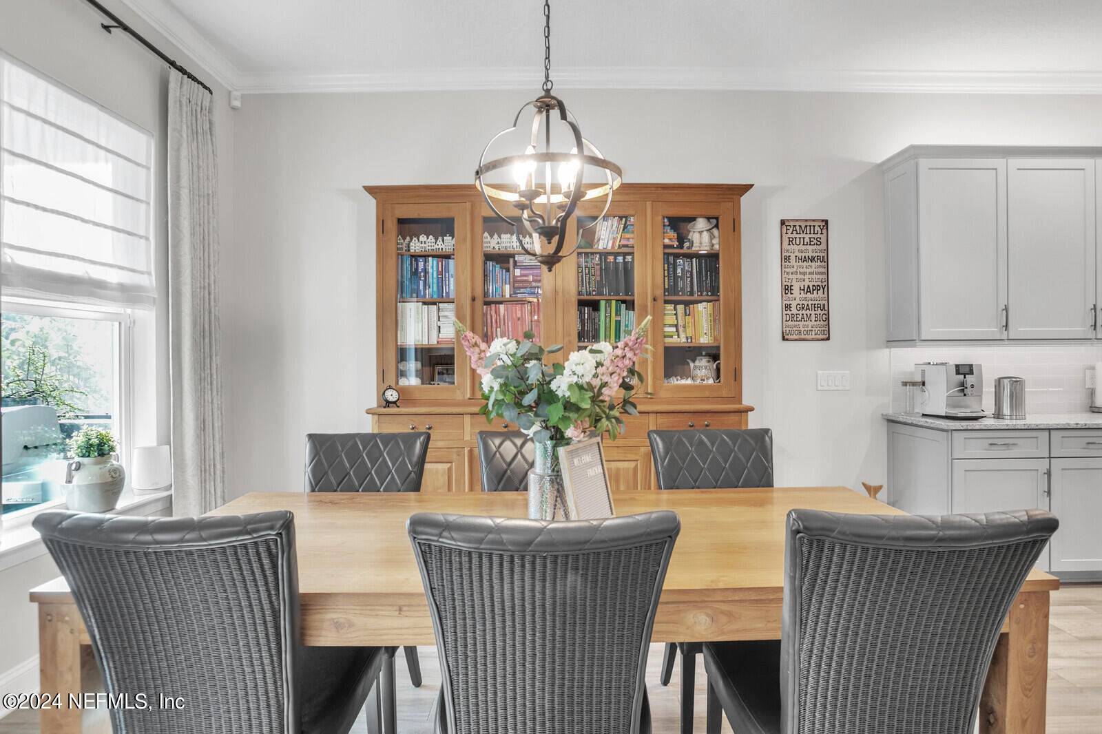 240 Pine Haven Drive St. Johns, FL 32259 - Photo 12 of 46 a dining room with furniture window and wooden floor