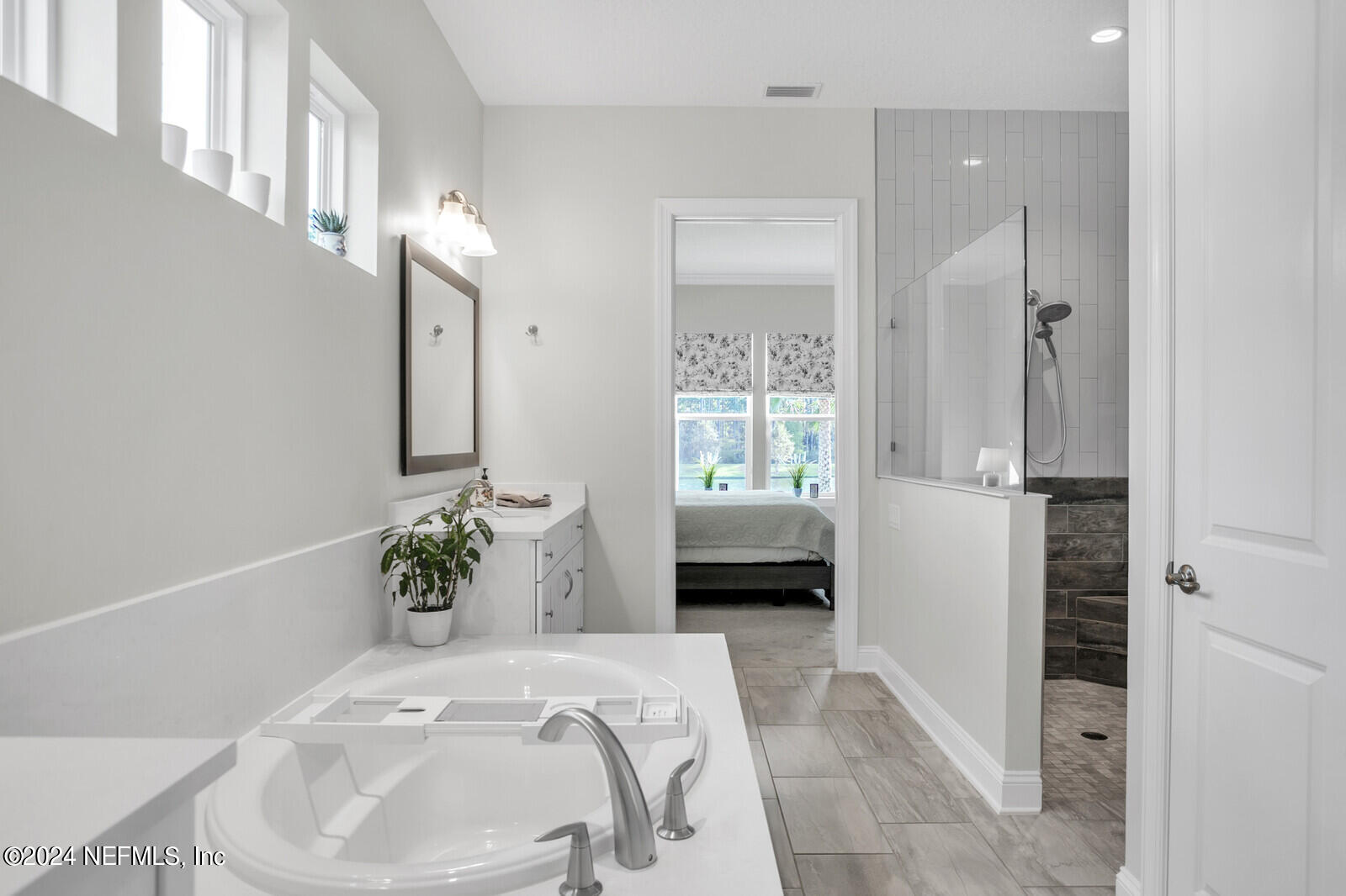 240 Pine Haven Drive St. Johns, FL 32259 - Photo 20 of 46 a bedroom with a bed and a window