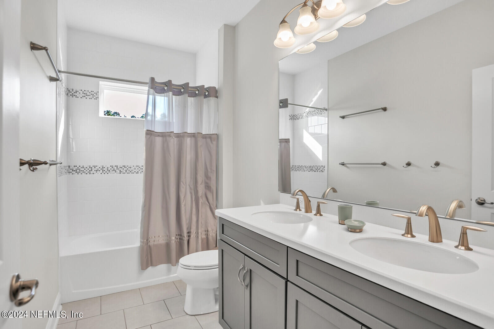 240 Pine Haven Drive St. Johns, FL 32259 - Photo 28 of 46 a bathroom with a granite countertop sink a toilet a mirror and shower