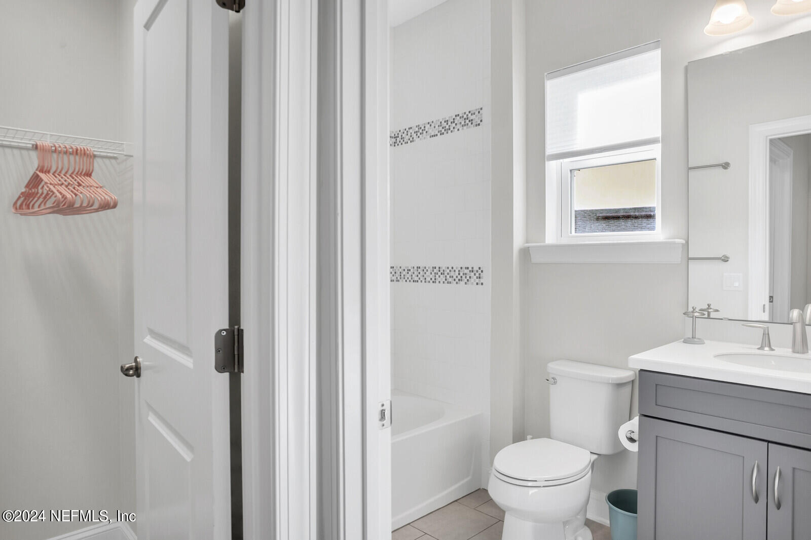 240 Pine Haven Drive St. Johns, FL 32259 - Photo 32 of 46 a bathroom with a toilet sink and a mirror