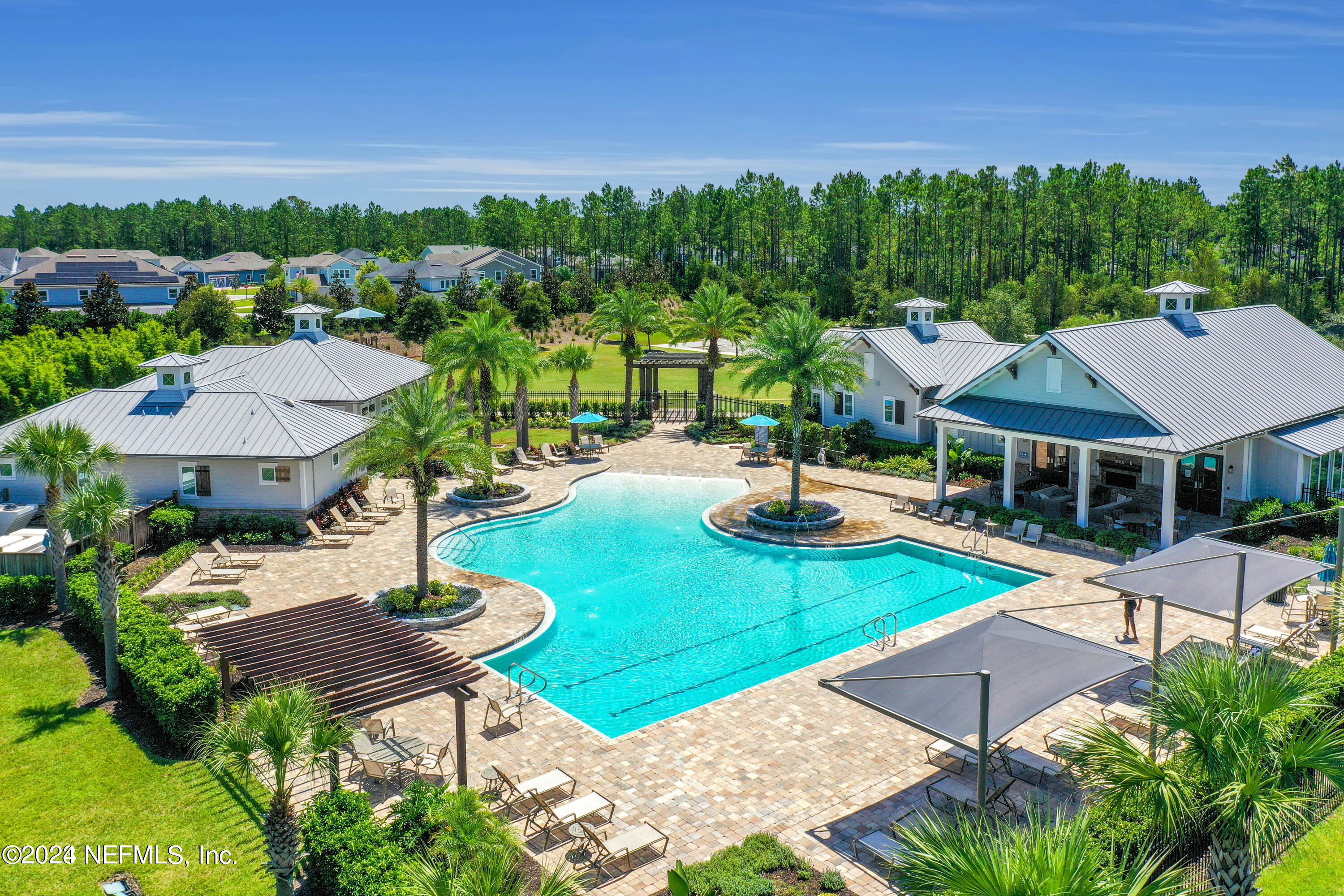 240 Pine Haven Drive St. Johns, FL 32259 - Photo 46 of 46 an aerial view of a house with garden space and street view