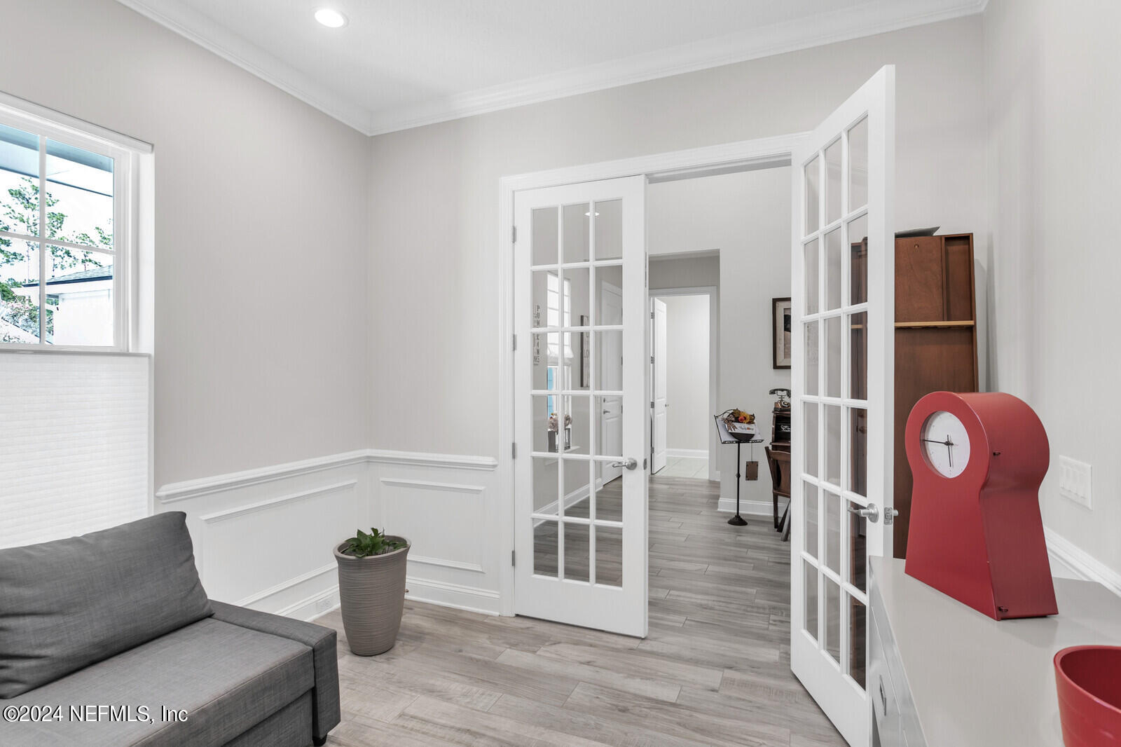 240 Pine Haven Drive St. Johns, FL 32259 - Photo 5 of 46 a living room with furniture a flat screen tv and windows