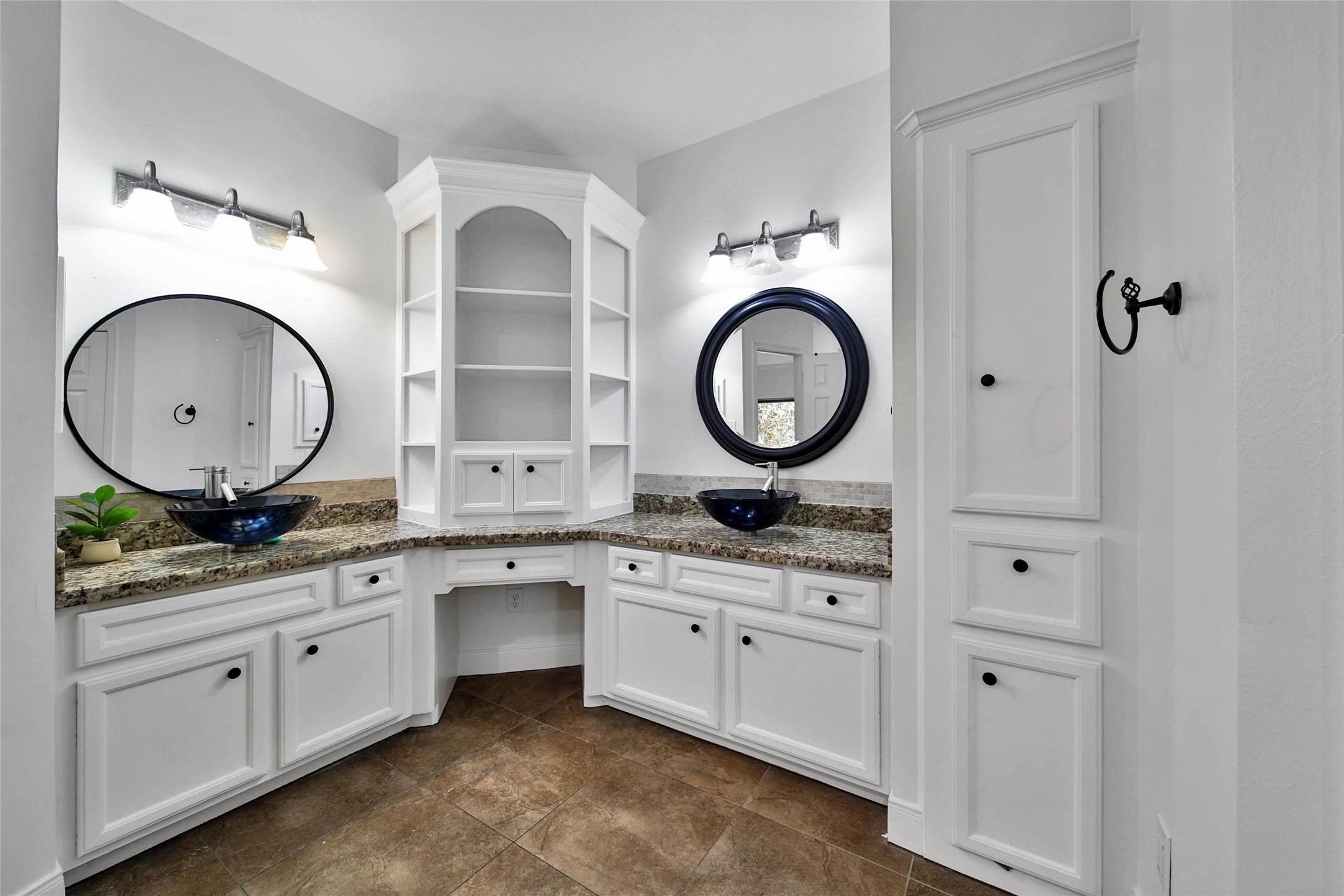 29919 Tudor Way Magnolia, TX 77355 - Photo 22 of 50 a bathroom with a granite countertop double vanity sink and a mirror
