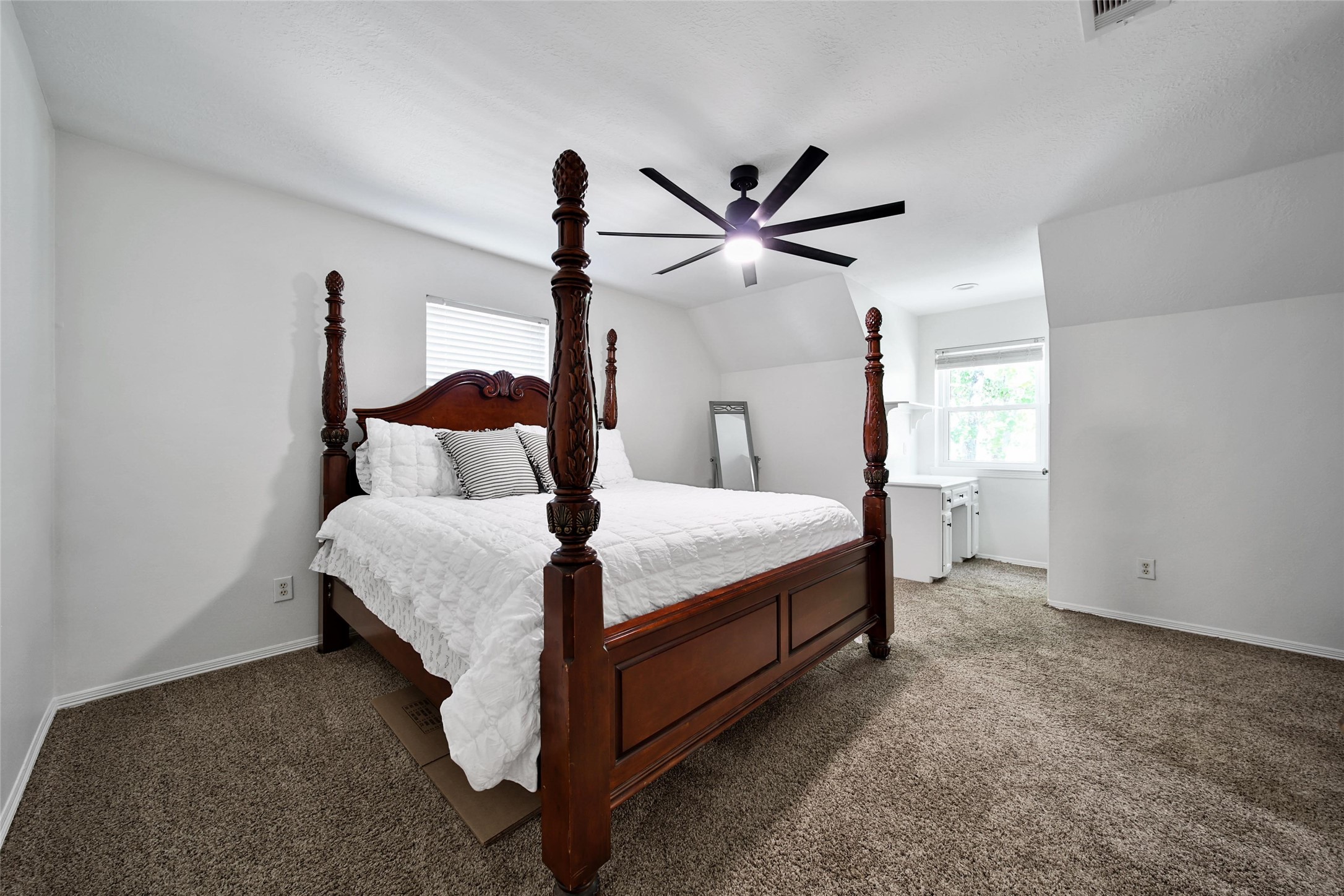 29919 Tudor Way Magnolia, TX 77355 - Photo 28 of 50 a bedroom with a bed and a ceiling fan