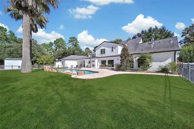 a view of a house with a big yard