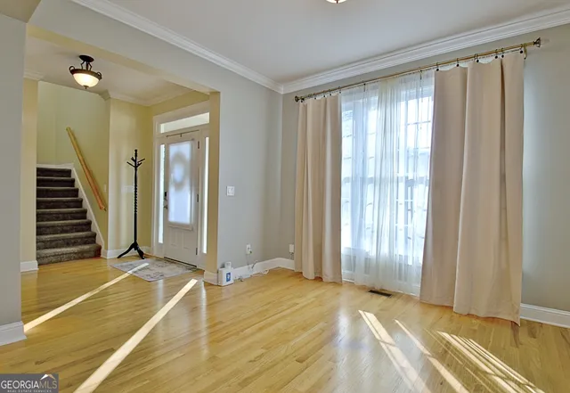 a view of a bathroom from a hallway
