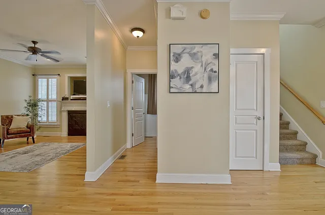 a bathroom with a sink toilet and a mirror