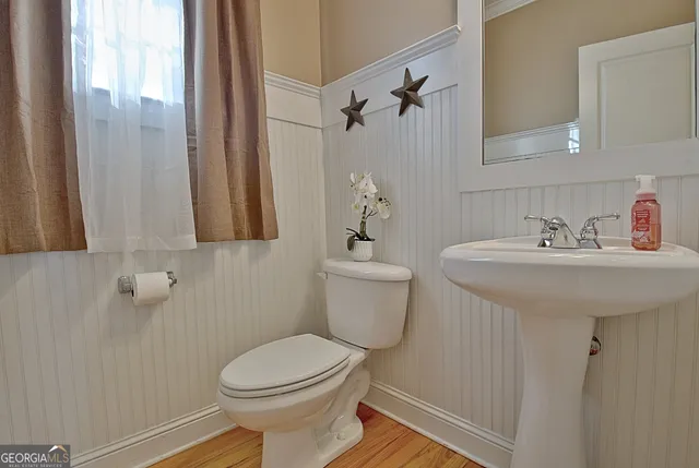 a living room with furniture fireplace and flat screen tv