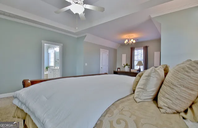 a front view of a house with garage