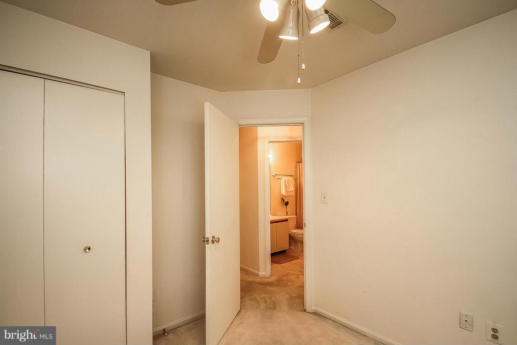 11029 Sentry Ridge Road, Unit 11 Manassas, VA 20109 - Photo 21 of 30 a view of a hallway with a room