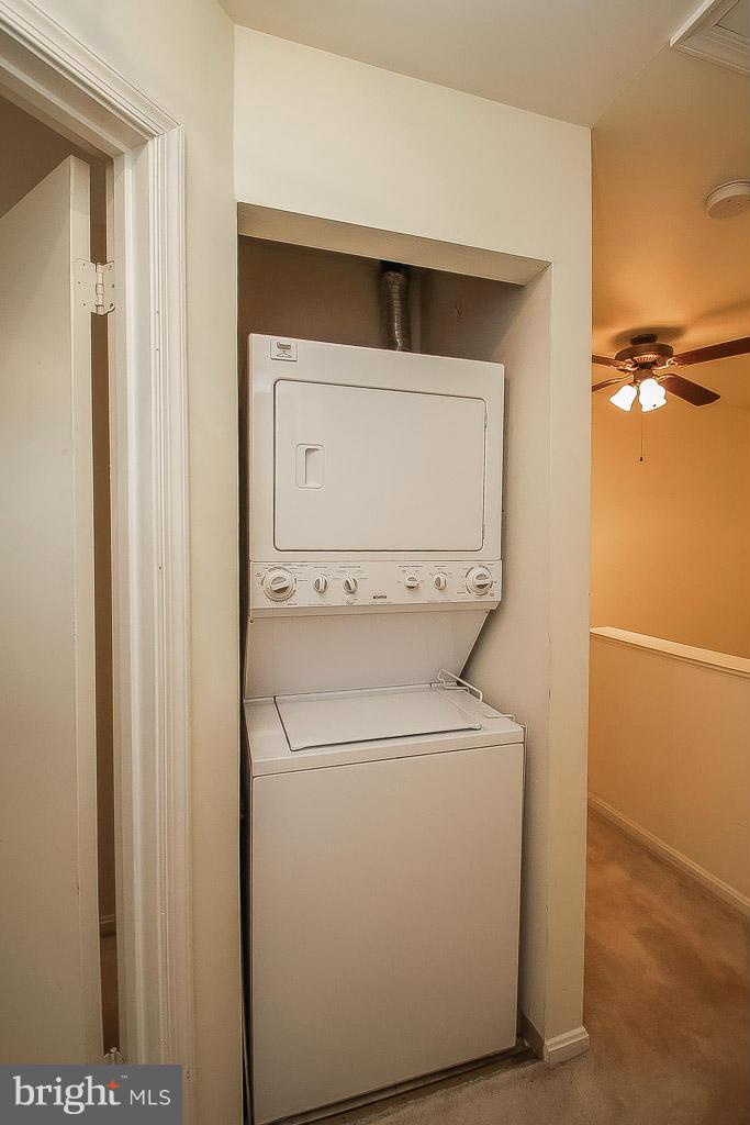 11029 Sentry Ridge Road, Unit 11 Manassas, VA 20109 - Photo 25 of 30 a utility room with dryer and washer